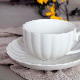 Popular Happy Go Pumpkin Embossed Porcelain Cup and Saucer