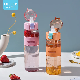  Wholesale Sports Tritan BPA Free Plastic Straw Bottle with Strap