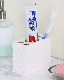  Self-Motion Toothpaste Dispenser Bathroom Products Plastic Bottle Toothbrush Holder