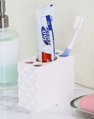 Self-Motion Toothpaste Dispenser Bathroom Products Plastic Bottle Toothbrush Holder
