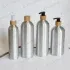  Made in China Bamboo Pump with Lotion Aluminum Bottle Container