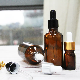  Wholesale Cosmetic 15ml 30ml 40ml Amber Frosted Clear Glass Dropper Bottle for Essential Oil