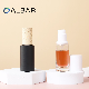  Airtight UV Proof 20ml 30ml Matte Black and Clear Round Cylinder Straight Attar Fragrance Serum Lotion Glass Oil Bottles with Bamboo Cap White Pump Thick Bottom