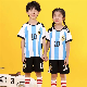  Summer Sport T-Shirt and Plaid Print Childrens′ Football Clothing Sets Tracksuit