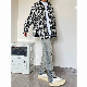  2023 New Fashion Wholesale Stock Tag Men Jeans Knee Puncture Design Zipper Hem Denim Jeans